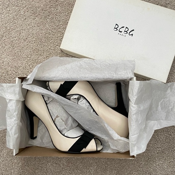 BCBG Shoes - Almost vintage BCBG antique white and black peep toe heels size 9 NIB